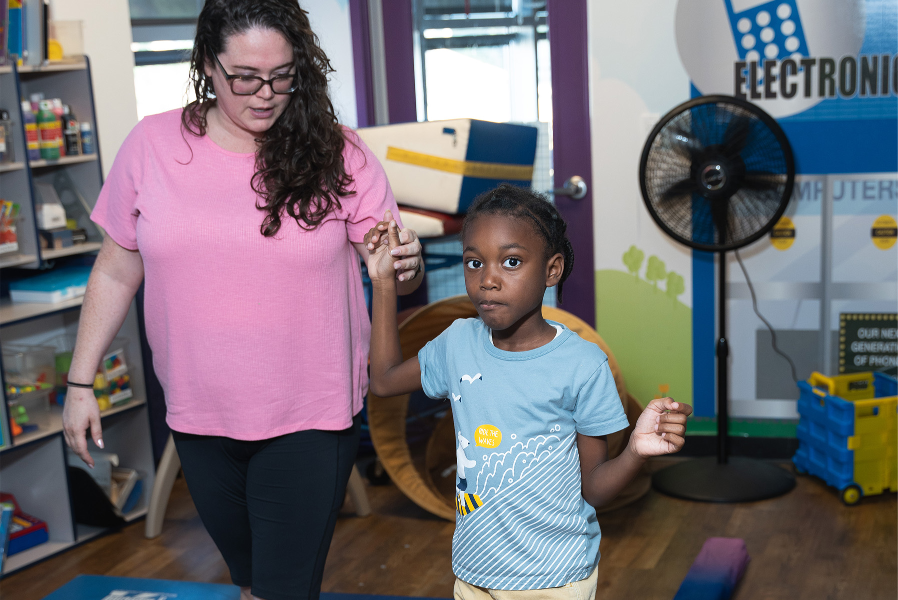 Student on a Therapy Swing With an Occupational Therapist